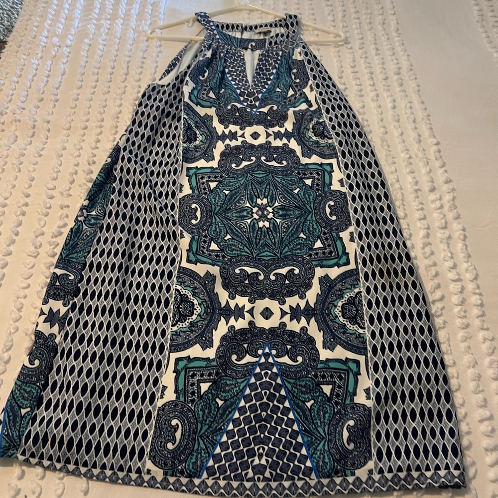 Like new dress halter style. Perfect dress for the summer:) Smoke free home ..